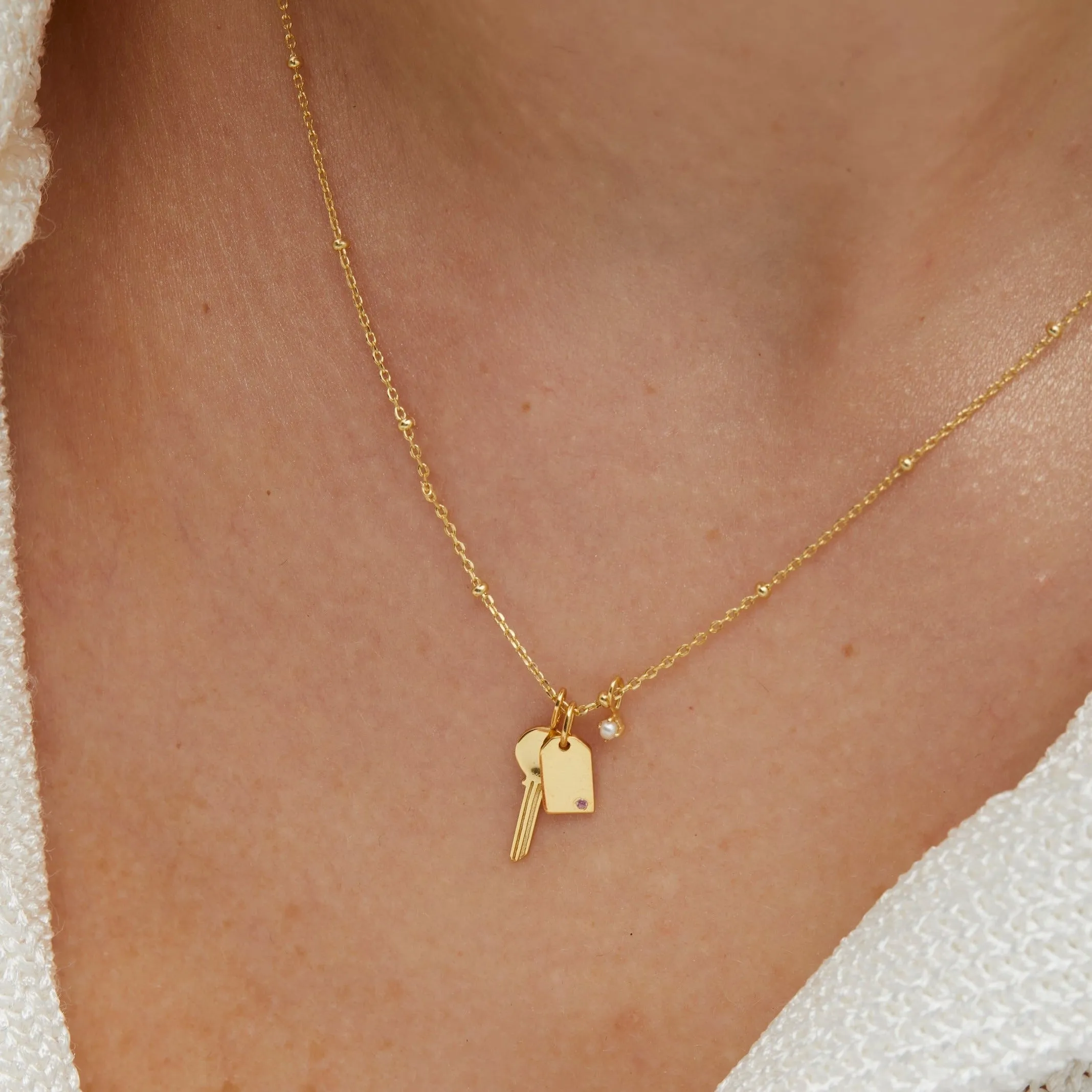 Nova Gold Charm Necklace